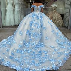 Details: Silhouette: Ball Gown Style Fabric: Tulle Fabric Color: Sky Blue Color Length: Chapel Train Neckline: Off the Shoulder Neckline Sleeves: Sleeveless Back: Corset Back Embellishment: Appliqued Quinceanera Dresses Princess, Sky Blue Quinceanera Dresses, Blue Quinceanera Dresses, Blue Quinceanera, Off Shoulder Ball Gown, 15 Birthday, Random Clothes, Quinceanera Dresses Blue, One Shoulder Prom Dress