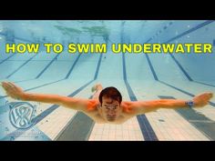 a man swimming in a pool with the words how to swim underwater