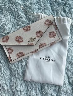 Coach Flower Print White Leather Wallet 1. 100% authentic 2. Please refer to listing pictures for the condition of the item. About shipment and Return Policy Item is located in China and normally it will take around 2-3 weeks for the item to arrive in US. If you need the item urgently, please contact me in advance and I will quote you the DHL additional shipping charge.  All the sales are final! No return and refund will be accepted. After purchase, you will receive a confirmation message with the retaken pictures for the item you bought. Shipment will be made only after receiving your confirmation message. I am an honest seller and only do business with serious buyers. Coach New York, Flower Print, 3 Weeks, Flower Prints, White Leather, Leather Wallet, Women's Accessories, Return Policy, Women Accessories