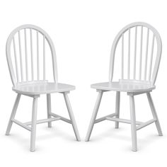 two white chairs sitting next to each other on a white surface with no one in it