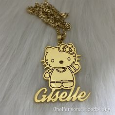 CUSTOM PERSONALIZED NAME CARTOON CHARACTER NECKLACE FOR KIDS This unique cartoon character necklace can be a perfect gift for your kids,baby,girls,boys,niece,daughter Features of our custom jewelry: -Real gold plating -Will not tarnish with proper care -It has a certain waterproof function, but if you want to have it for a long time, it is not recommended to touch water. -Firm, not easy to damage -hypoallergenic -Can be worn every day DETAILS -Finished: gold, silver, rose gold -Material: stainle Kids Name Jewelry, Necklace Name Design, Body Jewelry Diy, Custom Gold Jewelry, Necklace For Kids, Name Plate Necklace, Dope Jewelry Accessories, Hello Kitty Jewelry, Name Necklace Gold