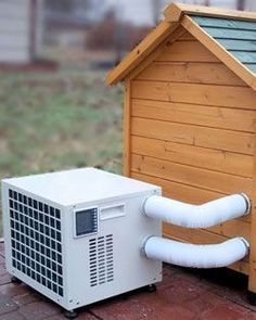 an air conditioner next to a dog house with the word rex written on it