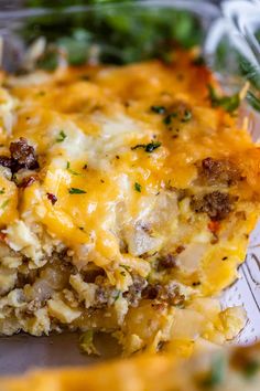 a casserole dish with meat and cheese on it