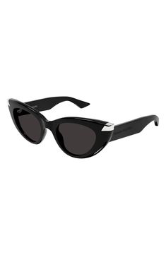 Retro-inspired design elevates stylish Italian sunglasses that fuse form and function. 50mm lens width; 21mm bridge width; 135mm temple length 100% UV protection Recycled acetate Made in Italy Black Acetate Cat Eye Sunglasses With Tinted Lenses, Modern Black Acetate Cat Eye Sunglasses, Modern Black Acetate Sunglasses, Modern Acetate Cat Eye Sunglasses With Mirrored Lenses, Black Acetate Cat Eye Sunglasses, Black Cat Eye Sunglasses In Acetate, Modern Black Acetate Shield Sunglasses, Modern Matte Black Cat Eye Sunglasses With Tinted Lenses, Modern Matte Black Cat Eye Sunglasses