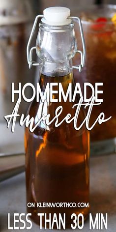 a glass bottle filled with liquid sitting on top of a table