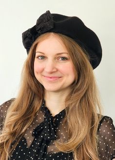 Practical and warm with a unique vintage vibe! Lovely very high quality Czech 100% wool beret.  Deep black color. (my photos do not due justice to this beret, it is som much better in person!) I decorated it with three vintage ribbons. Floral embroidered ribbon is from my travels in India. The black grosgrain  and velvet are both from France. One size fits all but beret has give and can stretch to fit most head sizes. It can be steamed and shaped larger if necessary. Beret circumference is the s Retro Black Hat For Fall, Winter Black Mini Hats One Size, Retro Black Beret For Winter, Retro Winter Cloche Felt Hat, Retro Cloche Felt Hat For Winter, Black Winter Beret, Black Winter Felt Hat, Elegant Black Beret For Fall, Black Wool Beret For Fall