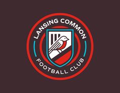 the logo for lansing common football club, with a bird perched on it's crest