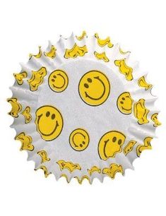 a bottle cap with yellow smiley faces on it