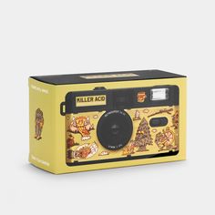 an old fashioned camera with pictures on it