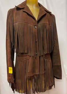 Brand: Joo Kay Style: Original Vintage 2 Tone              Suede leather Fringe Jacket            * Butterfly collar, 2 fringe pocket               & snap for close front Material: Suede Leather Size: 12 Measurements: 17" shoulder, 38"              chest, 35' waist, 24" arm & 32" length Condition: Mint Leather Outerwear With Fringe For Rodeo, Leather Fringe Outerwear For Rodeo, Fall Leather Jacket With Fringe For Rodeo, Leather Jacket With Fringe For Rodeo In Fall, Western Leather Jacket With Fringe For Winter, Long Sleeve Leather Jacket With Fringe For Rodeo, Western Leather Outerwear With Fringe, Western Leather Fringe Outerwear, Long Sleeve Outerwear With Tassels For Rodeo