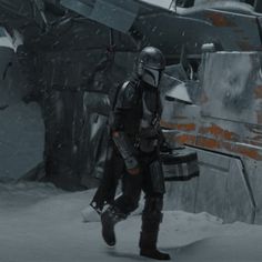 a star wars character walking in the snow