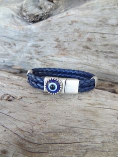 Men's Evil Eye Bracelet Navy Blue Braided Thick Leather | Etsy Blue Bracelets With Stainless Steel Clasp As A Gift, Adjustable Blue Jewelry With Leather Strap, Adjustable Blue Leather Strap Bracelets, Adjustable Blue Leather Strap Jewelry, Nazar Bracelet, Classic Blue Pantone, Blue Pantone, Pantone 2020, Mens Cuff