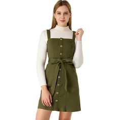 Update your weekend collection with this classic green dress. Fit and flare dress structure adds a playfulness to your outfits and the button detailing gives a 60s inspired feel. Featuring a square neck, sleeveless design, and adjustable strap. Perfect for the weekend, wear with trainers and a cross body bag for an off-duty look. Please check your measurements to make sure the item fits before ordering. Model Body Size: Height: 5'6", Chest: 32 5/8 inches, Waist: 24 3/8 inches, Hip: 35 3/8 inches Overall Denim Dress, Jean Overall Dress, Denim Jean Dress, Denim Overall Dress, Suspender Dress, Classic Jeans, Classic Dress, Overall Dress, Denim Fabric