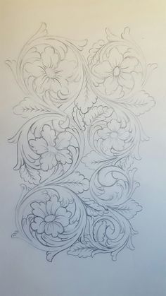 a drawing of an intricate design on paper