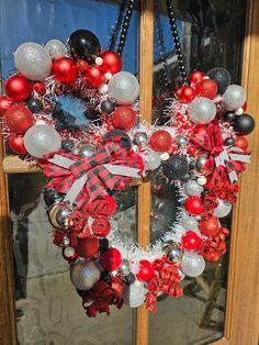 This wreath shimmers in the sun showing all the colors and glitter. This wreath can be displayed outside under a covered area or inside! Door Wreath Hanger, Door Hangers, Door Wreaths, All The Colors, Minnie Mouse, The Sun, Wreath, Glitter, Sun