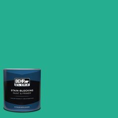 a can of behro ultra stain - blocking paint on a turquoise green background