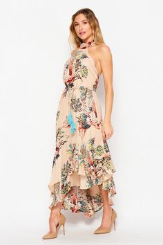 Color: Taupe Floral Tiered Halter Neck Dress Self Tie Neck Waist Tie With Tassel Detail Asymmetrical Ruffle Hem 100% Polyester Halter Neck Dress, Halterneck Dress, Tie Neck, Waist Tie, Ruffle Hem, Halter Neck, High Low Dress, Neck Tie, Neck Dress