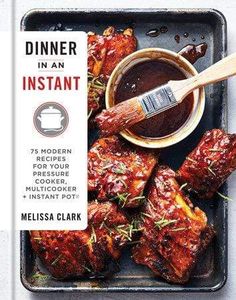 the cover of dinner in an instante cookbook with ribs and sauce on it