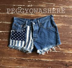 RAG CUT OFF DENIM FESTIVAL SHORTS 100% COTTON button FLY levis 501 ORIGINAL PEGGYOWASHERE™ JOSABUD© AMERICAN FLAG SEWN PATCH™/ORIGINAL P.O.W.H. DESIGN HANDMADE PATCH, blue and WHITE sewn stripes NAVY BACKROUND AND WHITE STARS size 8 US 29 INCH WAIST hips 38 rise 10 Denim Festival, Aztec Shorts, Levis 501 Original, Handmade Patch, Patchwork Shorts, H Design, Festival Shorts, Cut Offs, White Stars