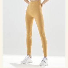 Prepare to breeze through hot yoga in the Energy Legging, an update to the popular full-length version. Made by Italian Seamless Weave with fragrance. Hits at the ankle on petites and pairs perfectly with your fave pair of sneakers or slides. Athleisure Women, Yoga Set, Hot Yoga, The Energy, Sweater Coats, Black Friday Sale, Yellow Black, Bra Tops, Dress Accessories