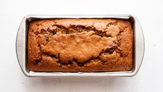 a loaf of banana bread in a metal pan