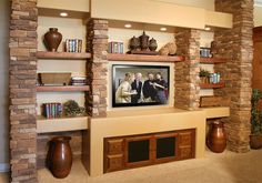 a living room filled with lots of furniture and decor