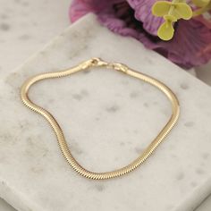 Material: Gold Carat: 14K (585) Solid Gold   Snake Chain 14k Solid Gold Bracelet, 3.5mm Width Polished Herringbone Chain Bracelet, Handmade Snake Bracelet, Chain Bracelet, Gift for Her Details 14K Solid Gold Plated is not gold it is real solid gold Gold Color Options; Material: Solid Gold Karat: 14 K (585) Chain width: 3.5 mm - All products are made to order in Turkey. - This product is sleek and stylish. It is produced carefully to make you and your loved ones happy. Prepared with love and expe Gold Arm Band, Gold Snake Chain, Solid Gold Bracelet, Herringbone Chain, Gold Armband, Jewellery Marketing, Snake Bracelet, Bracelet Chain, Gold Snake