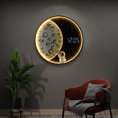 a clock that is on the wall next to a chair