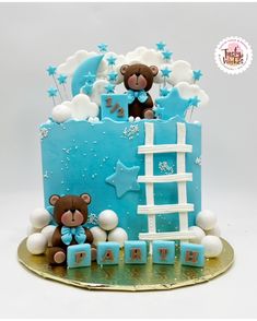 a teddy bear themed birthday cake with stars and moon