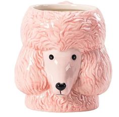 a pink ceramic poodle planter on a white background