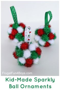 two small christmas wreaths with red, white and green pom - poms