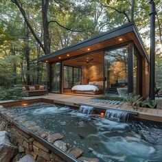 an outdoor hot tub in the middle of a wooded area