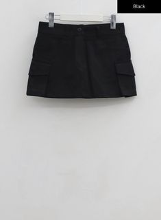 Black / M Streetwear Mini Skort With Pockets, School Uniform Style Skort For Workwear, Solid School Skirt With Pockets, Black Mini Cargo Skirt For Streetwear, Black Mini Cargo Skirt For Work, School Mini Skirt With Pockets, Y2k Black Skort With Pockets, Black Y2k Skort With Pockets, Y2k Style Black Skirt With Pockets