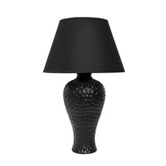 a black table lamp on a white background