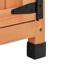 an image of a wooden door with black handles