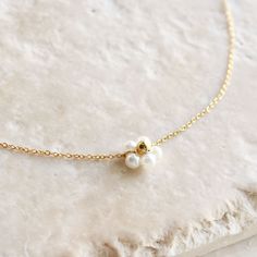 Daisy Flower Pearl Pendant Necklace- Featuring a Daisy Pearl Necklace, dainty and simple- Length: 16" + 2.5" Extender- Base Material: High Quality 925 Sterling Silver- Finish: 18K Gold- Nickel Free - All our jewelry is packaged in gift ready boxes. If you would like multiple items from your order packaged separately please let us know! © 2023 Generation of Daughters Daisy Pearl Necklace, Daisy Necklace, Pearl Pendant Necklace, Necklace Dainty, Daisy Flower, Pearl Pendant, Pearl Necklace, Daisy, 18k Gold