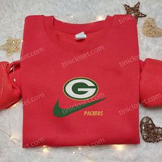 Green Bay Packers NFL Sports Swoosh Embroidered Shirt Imagine a fusion of timeless tradition and modern athleticism, embodied in a single garment. This is the essence of our Green Bay Packers NFL Sports Swoosh Embroidered Shirt, a unique piece that seamlessly blends the storied history of the Packers with the iconic design of the Nike Swoosh. From our Sports Embroidered Shirt, NFL Embroidered Shirt, and Brand Logo Embroidered Shirt collections, this shirt stands out as a testament to our commitm Nfl Packers, Nfl Sports, Iconic Design, Nike Swoosh, Green Bay Packers, Great Love, Embroidered Shirt, Green Bay, Logo Embroidered