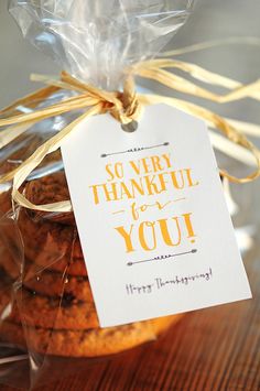 a cookie in a bag with a tag that says, so very thoughtful for you