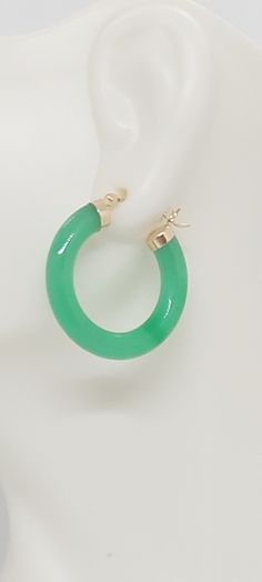 GREEN Jade Hoop Earrings in 14K Yellow Gold. 24 millimeters. Green Jade 14k Yellow Gold Hoop Earring. JADE Lover. Product Info: -Earring diameter: 24 millimeters -Metal: 14K. -Stone: Green Jade. -Colors: Green. -Finish: 14k Yellow gold. -Stone dimension: 4mm -Nice Gift box is included. Green 14k Gold Hoop Earrings, Green Jade Hoop Jewelry, Green 14k Gold Fine Jewelry Hoop Earrings, Green 14k Gold Hoop Earrings Fine Jewelry, Green Pierced Hoop Earrings, Green Pierced Hoop Earrings For Anniversary, Green May Birthstone Hoop Earrings, Small Green Pierced Hoop Earrings, Green Small Hoop Earrings Fine Jewelry