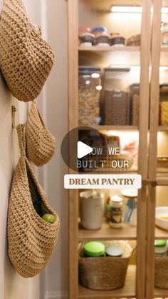 there are baskets hanging on the wall in this kitchen with text overlay that reads, how we built it our dream pantry