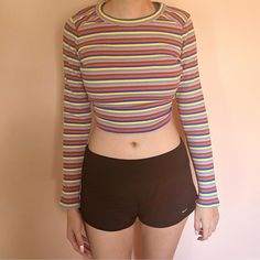 Multicolor Target Wild Fable Long-Sleeve Crop Top This Rainbow/Multicolor Top From The Target Brand Wild Fable Is In Perfect Condition And Still Has The Original Tags! It's So Comfortable And A Great Top To Wear To Elevate A Simple Outfit. The Tag Is Marked As A Medium But It Can Be Worn By Smaller Or Larger Sizes (It's Fairly Stretchy). Rainbow Fitted Crew Neck Top, Fitted Rainbow Crew Neck Top, Multicolor Long Sleeve Tops With Rainbow Print, Fitted Rainbow Casual Top, Long Sleeve Summer Tops With Rainbow Print, Fitted Casual Rainbow Tops, Multicolor Long Sleeve Stretch Crop Top, Multicolor Stretch Long Sleeve Crop Top, Colorful Long Sleeve Color Block Tops