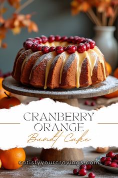 an orange bundt cake with cranberries on top