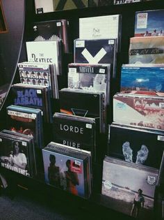 there are many cd's on display in the store