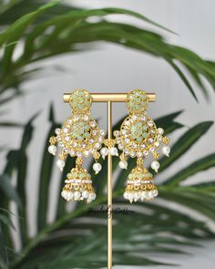 These are beautiful light green jhumka earrings. * Measurements/Attributes: 7 cm length * Includes gift box? NO * Ready to ship? YES * Additional colors? NO * Customizable? NO (check our shop for other customizable jewelry) * This product is handcrafted therefore, minor imperfections may be present. * QUESTIONS? GROUP/BRIDESMAID ORDERS? FIRST TIME BUYING DESI/SOUTH ASIAN JEWELRY? Message us! * Check FAQ section for additional information. Green Jhumka, South Asian Jewelry, Nikkah Wedding, Wedding Bollywood, Hot Pink Floral, Customizable Jewelry, Asian Jewelry, Pakistani Jewelry, Choker Necklace Set