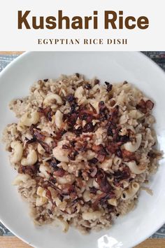 a white plate topped with rice and nuts