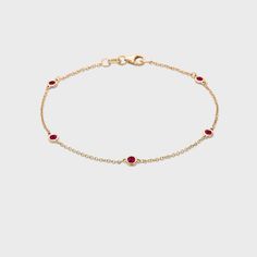 This classic 14k gold bracelet with natural gemstones is a must-have for every jewelry collection! 14k Gold Diamond Bracelet With Birthstone, 14k Gold Round Diamond Bracelet With Birthstone, 14k Gold Birthstone Bracelets, 14k Gold Birthstone Bracelets Fine Jewelry, Fine Jewelry 14k Gold Bracelet With Birthstone, Elegant 14k Gold Polished Gemstones, Classic Ruby Diamond Bracelet, Classic Round Ruby Diamond Bracelet, Sterling Silver Fine Jewelry Bracelets