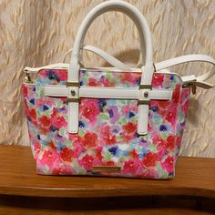 Floral Bag With Sling Almost Brand New Used Once White Floral Print Shopping Bag, White Floral Print Shoulder Bag For Shopping, White Feminine Shoulder Bag For Spring, Feminine White Shoulder Bag For Spring, Multicolor Floral Print Bags For Day Out, Multicolor Floral Print Bag For Day Out, White Floral Print Satchel Shoulder Bag, White Shoulder Bag With Detachable Strap For Spring, White Floral Print Satchel Bag