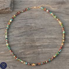 This delicate adjustable necklace makes a wonderful gift for yourself, friend or loved one.      Multi coloured Jasper beaded necklace with rose gold plated alloy spacer beads , Natural Stones , Adjustable . Boho style      Jade size ; 2X4mm       Size: Around 16 inches   Jasper sustains and supports through times of stress, and brings tranquility and wholeness. It provides protection and absorbs negative energy.       Please note: All natural stone will have slight color difference. Each stone is unique in its color variations and texture due to the natural difference in the stones themselves.       Do not expose to chemicals like deodorants or perfumes       Disclaimer: Stones  are not intended to diagnose, treat, cure or prevent any diseases.       NOTE: This necklace is not a machine m Green Heishi Beads Necklace For Gift, Spiritual Heishi Bead Necklace For Gift, Gift Gemstone Beaded Necklaces With Heishi Beads, Gift Gemstone Heishi Beads Necklace, Gift Gemstone And Heishi Beads Necklace, Dainty Heishi Beads Jewelry For Gifts, Adjustable Spiritual Necklace With Letter Beads, Spiritual Adjustable Necklace With Letter Beads, Multicolor Dainty Beaded Necklace For Gift