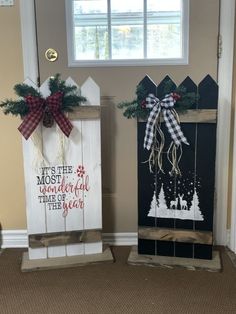 two wooden signs with christmas decorations on them