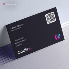 a close up of a business card with qr code on the front and back